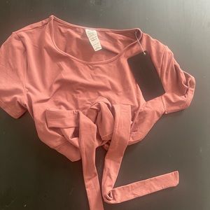 brand new ultrasoft wrap tie top from alphalete, never reached for it